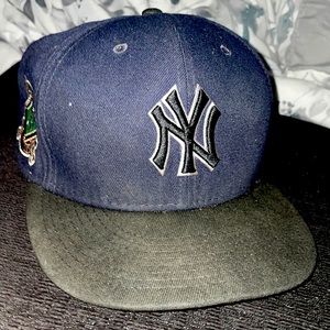 New York Yankees hat. Dark blue
